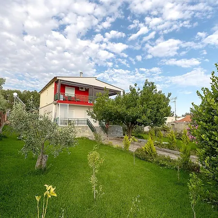 Thalori House *