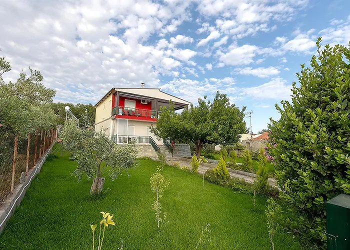 Thalori House *